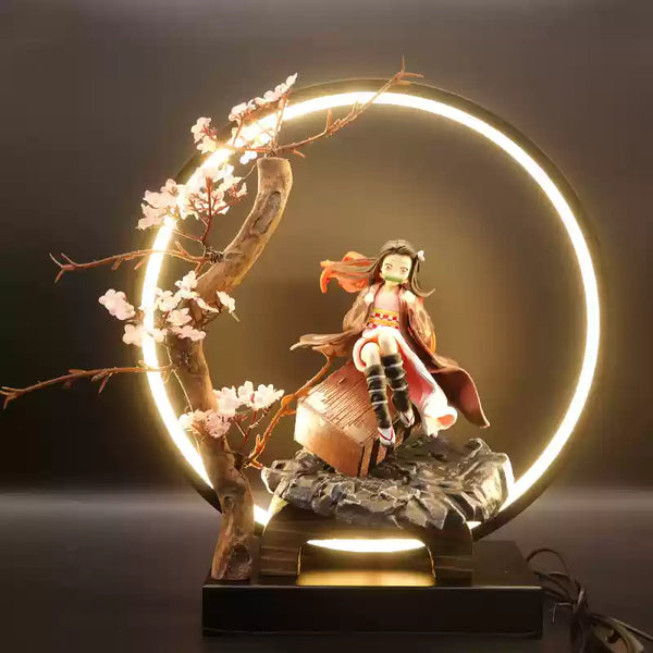 Demon Slayer Nezuko Kamado figure with LED circle display and sakura tree, perfect for anime collectors