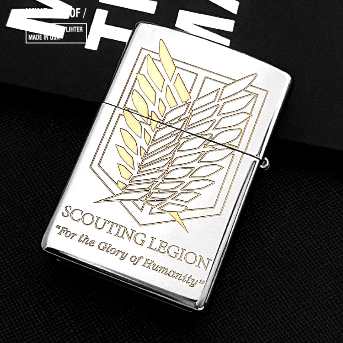 Back view of the Eren Yeager Attack on Titan Zippo lighter featuring the engraved Wings of Freedom and Scouting Legion emblem with the quote "For the Glory of Humanity.