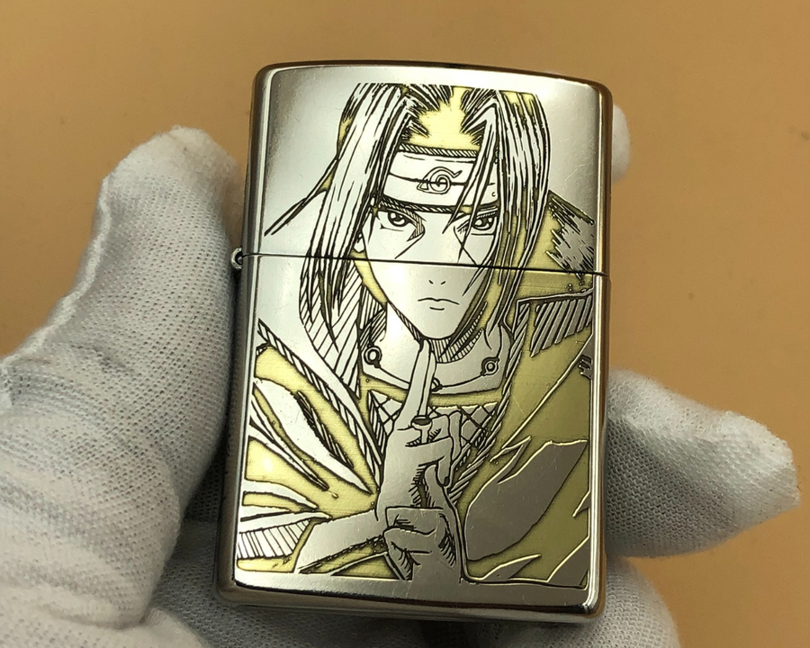 Lighter with anime character design held by a gloved hand against a beige background