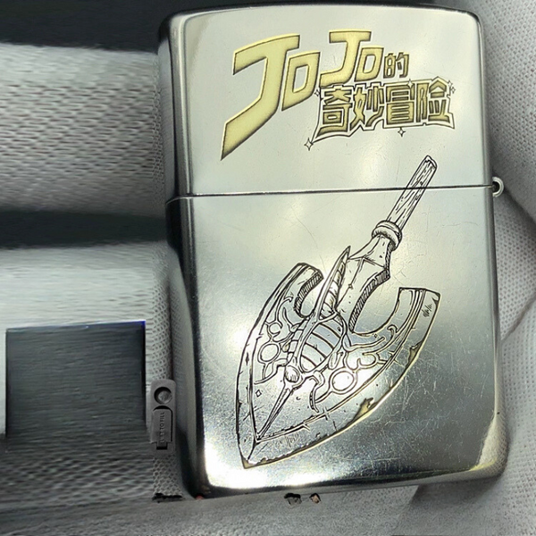 Backside view of the JoJo's Bizarre Adventure custom lighter featuring an intricately engraved axe design, showcasing detailed craftsmanship.