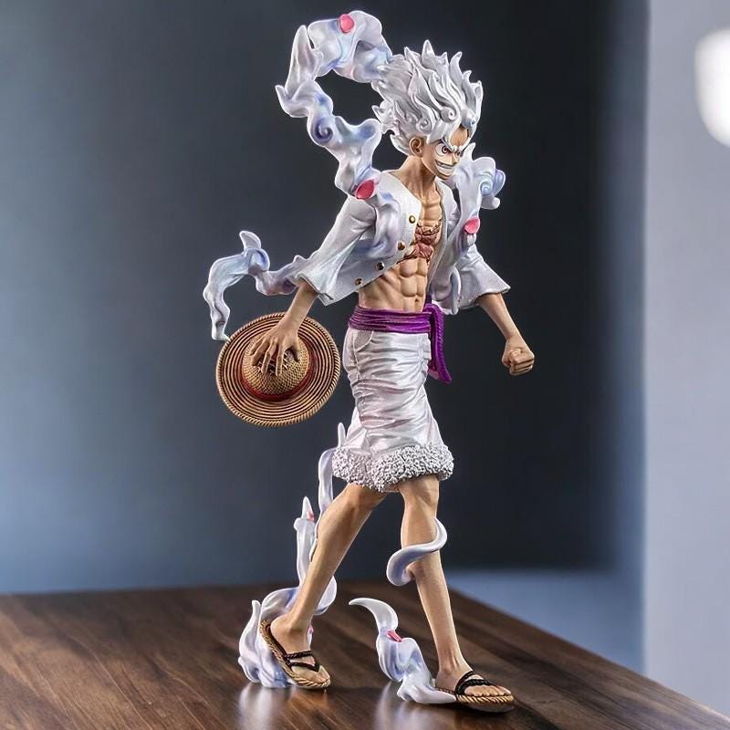 One Piece Luffy 23 cm figure in dynamic pose with straw hat, detailed with energy effects and high-quality craftsmanship, perfect for collectors.