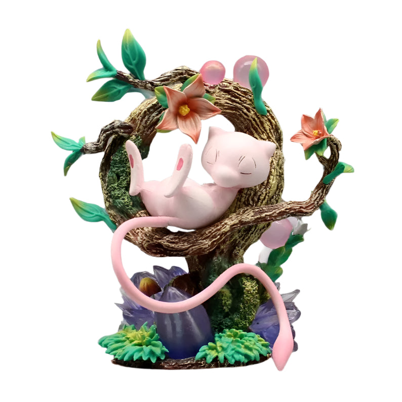 Pokémon Mew figure with LED light, sitting on a tree branch surrounded by colorful flowers.