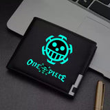 One Piece wallet with glowing design featuring the iconic skull logo. A sleek and stylish accessory for fans of the anime series.