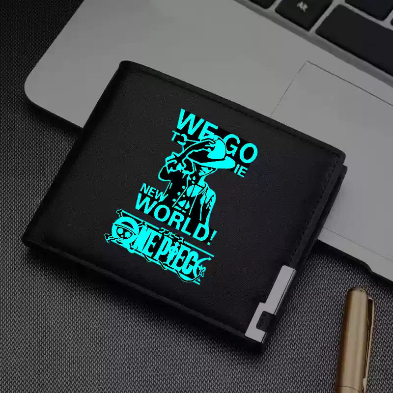 One Piece wallet with glowing design, featuring the "We Go to the New World!" quote and a silhouette of a pirate