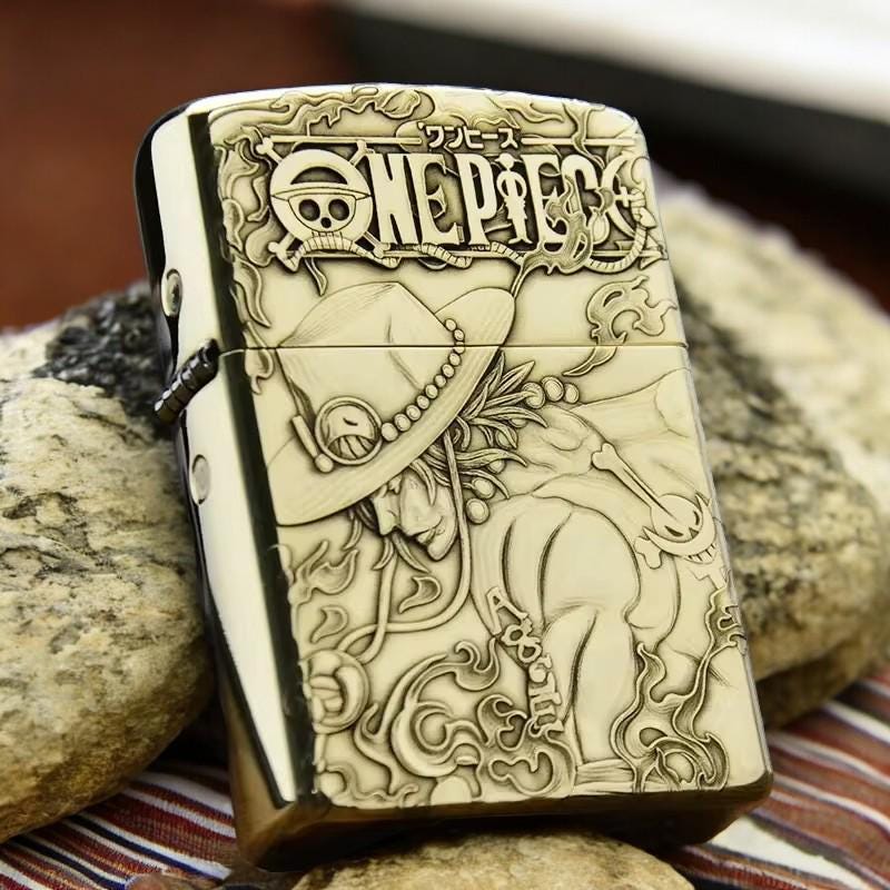 Front view of closed engraved metal lighter featuring Portgas D. Ace from One Piece - perfect collectible for anime fans