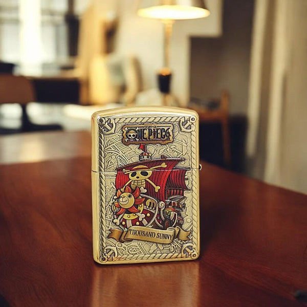 Engraved brass lighter featuring Thousand Sunny ship from One Piece - collectible item for anime fans