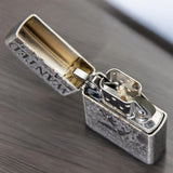 Open Zorro One Piece lighter showcasing the inner mechanism and engraved 